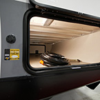 Door Side Pass Through Storage 
 May Show Optional Features. Features and Options Subject to Change Without Notice.