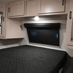 Bedroom - 60 Inch by 80 Inch Bed, Two Overhead Storage Cabinets, and Wardrobes on Either Side of the Bed
 May Show Optional Features. Features and Options Subject to Change Without Notice.