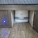 Clipper 12.0TD Storage Under the Bed Open to Reveal Porta Potti May Show Optional Features. Features and Options Subject to Change Without Notice.