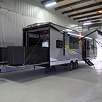 Adrenaline 27KB Exterior Showing Optional Ramp Door Party Patio Kit May Show Optional Features. Features and Options Subject to Change Without Notice.