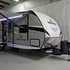 Adrenaline 27KB Exterior Front 3/4 Viewing Showing Power Tongue Jack, Diamond Tread Plate and Awning Extended May Show Optional Features. Features and Options Subject to Change Without Notice.