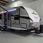 Adrenaline 27KB Exterior 3/4 Front View Showing Power Tongue Jack, Diamond Tread Plate, LED Awning Lights and Aluminum Steps May Show Optional Features. Features and Options Subject to Change Without Notice.