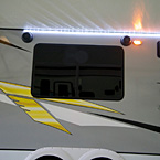 Power Awning w/LED Light Strip May Show Optional Features. Features and Options Subject to Change Without Notice.