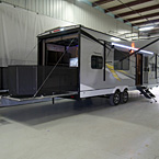 Adrenaline 27KB Exterior Rear 3/4 View Showing Optional Ramp Door Party Patio Kit May Show Optional Features. Features and Options Subject to Change Without Notice.