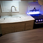 Adrenaline 27KB Kitchen with Seamless Edge Countertops and Flush Mount Sink Covers May Show Optional Features. Features and Options Subject to Change Without Notice.