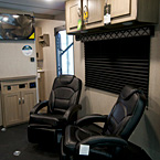 Adrenaline 21LT Showing (2) Movable Rocking Chairs Positioned on the Entry Door Side of the Travel Trailer. May Show Optional Features. Features and Options Subject to Change Without Notice.