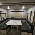 U-shaped dinette with pleated night window shades May Show Optional Features. Features and Options Subject to Change Without Notice.