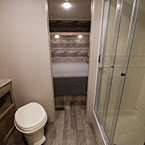 bathroom toilet and glass shower May Show Optional Features. Features and Options Subject to Change Without Notice.