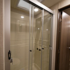 Glass Step-In Shower w/ABS Surround  May Show Optional Features. Features and Options Subject to Change Without Notice.