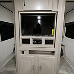 Entertainment Center with Storage Above TV and Radio, Small Storage Cubbie with 2 Doors Underneath for Storage May Show Optional Features. Features and Options Subject to Change Without Notice.