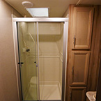 Bathroom- Step-In Shower with Glass Door and Cream Colored Shower Surround, Linen Closet- 3 Doors
 May Show Optional Features. Features and Options Subject to Change Without Notice.