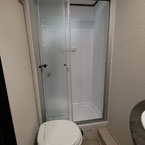 Bathroom- Skylight Above 36 Inch by 30 Inch Shower and Textured Glass Shower Door, Foot Flush Toilet Next to Shower
 May Show Optional Features. Features and Options Subject to Change Without Notice.