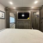 View of LED TV bedroom, with drawers, cabinets and storage space, mirrors
 May Show Optional Features. Features and Options Subject to Change Without Notice.