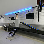 Door Side with Optional Solid Steps Shown Extended. Awning LED Shown on in Blue.

 May Show Optional Features. Features and Options Subject to Change Without Notice.