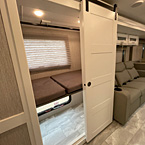 multi-functional “BOW” room that easily converts from Bunk to Office to Wardrobe, barn sliding door
 May Show Optional Features. Features and Options Subject to Change Without Notice.