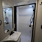 Shower with Door Shown Open and Skylight
 May Show Optional Features. Features and Options Subject to Change Without Notice.