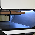 Exterior Pass-Through Storage with Lights Shown On
 May Show Optional Features. Features and Options Subject to Change Without Notice.