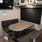 Dinette, Overhead Storage Cabinets, and Entertainment Center
 May Show Optional Features. Features and Options Subject to Change Without Notice.