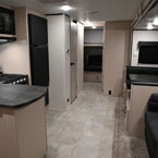 Front to Back - Kitchen, Sofa, Dinette, Bathroom Shown Closed, and Part of Bunk Room
 May Show Optional Features. Features and Options Subject to Change Without Notice.