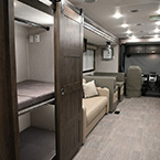 Back to Front - Bunk Room Shown Open, Sofa, Dinette, and Driver's Seat May Show Optional Features. Features and Options Subject to Change Without Notice.