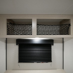 Storage Above Window by the Bed with Light Shown On May Show Optional Features. Features and Options Subject to Change Without Notice.