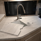 Stainless Steel Faucet with Double Bowl White Sink and Sink Covers. May Show Optional Features. Features and Options Subject to Change Without Notice.