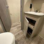 Vanity Shown Open with Two Shelves. 
 May Show Optional Features. Features and Options Subject to Change Without Notice.
