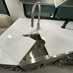 view of High Rise Kitchen Faucet, Farmhouse Sink and sink covers  May Show Optional Features. Features and Options Subject to Change Without Notice.