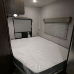 Murphy Queen Bed with Cargo Door at the Rear. 
 May Show Optional Features. Features and Options Subject to Change Without Notice.