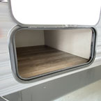 Front Storage Compartment on the Off-Door Side Shown Open.
 May Show Optional Features. Features and Options Subject to Change Without Notice.