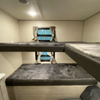 28 Inch by 74 Inch Bunk Beds, Each with a Window in the Bunk.
 May Show Optional Features. Features and Options Subject to Change Without Notice.