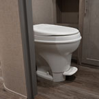 White Foot Flush Toilet.
 May Show Optional Features. Features and Options Subject to Change Without Notice.