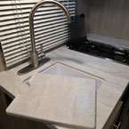 Single Bowl Sink with Stainless Steel Faucet and Sink Cover.
 May Show Optional Features. Features and Options Subject to Change Without Notice.