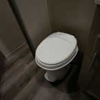 Foot Flush White Toilet.
 May Show Optional Features. Features and Options Subject to Change Without Notice.