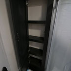 Two Door Linen Closet Shown Open with Four Shelves.
 May Show Optional Features. Features and Options Subject to Change Without Notice.