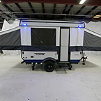 Door Side with Tents and Steps Shown Extended, Blue LED Lights Shown On.
 May Show Optional Features. Features and Options Subject to Change Without Notice.