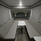 Interior Front to Back with Two 70 Inch Gaucho Sofas with Free Standing Dinette. Rear Bunk with Queen Size Bunk Mat.
 May Show Optional Features. Features and Options Subject to Change Without Notice.