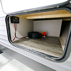 Outside Storage Compartment Shown Open. Optional Solar Panel Package with Solar Controller Shown. 
 May Show Optional Features. Features and Options Subject to Change Without Notice.