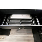 Silverware Drawer Shown Open with Six Compartments.
 May Show Optional Features. Features and Options Subject to Change Without Notice.