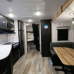 Interior Front to Back; Kitchen Galley, Bunks, Bathroom Door Shown Closed, U-Shaped Dinette.
 May Show Optional Features. Features and Options Subject to Change Without Notice.