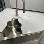 Stainless Steel Farmhouse Sink, Brushed Nickel Hardware and Fixtures May Show Optional Features. Features and Options Subject to Change Without Notice.