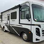 Exterior door side view of Coachmen Pursuit 27XPS and storage compartments
 May Show Optional Features. Features and Options Subject to Change Without Notice.