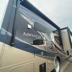 Exterior door side view of Coachmen Mirada 315KS from rear

 May Show Optional Features. Features and Options Subject to Change Without Notice.