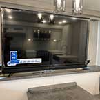 Tv With Lift In The Up Position Above Dinette
 May Show Optional Features. Features and Options Subject to Change Without Notice.