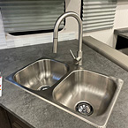 Kitchen Stainless Steel double sink and High Rise Kitchen Faucet
 May Show Optional Features. Features and Options Subject to Change Without Notice.