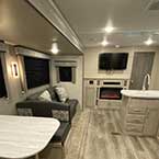 Interior view of Coachmen Catalina living space from rear to front
 May Show Optional Features. Features and Options Subject to Change Without Notice.