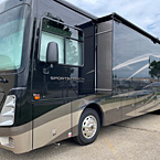 Exterior view of the Coachmen Sportscoach 376ES off door side with slide out
 May Show Optional Features. Features and Options Subject to Change Without Notice.
