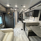 Interior full view of the Coachmen Sportscoach 376ES. From the front looking back
 May Show Optional Features. Features and Options Subject to Change Without Notice.