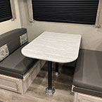 Dinette with pedestal thermofoil table, under bench storage with easy access booth storage doors May Show Optional Features. Features and Options Subject to Change Without Notice.