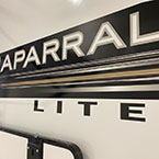 Close-up of brand logo on door-side of unit May Show Optional Features. Features and Options Subject to Change Without Notice.
